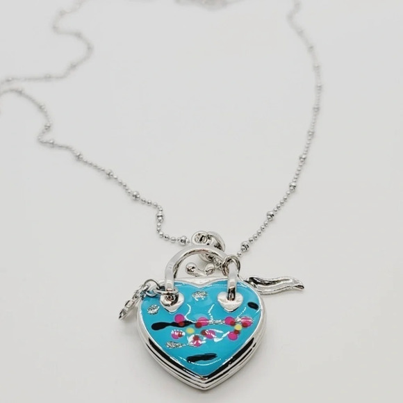 Jewelry - NWOT Heart Purse Shape Pendant Silver Rhodium Necklace
